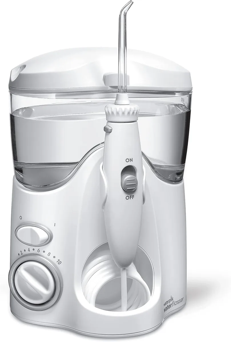 Waterpik Ultra WF-100EU irrigador de sobremesa · 10 modos · 6 boquillas · 110-230 V · tapa Arkebion RFID